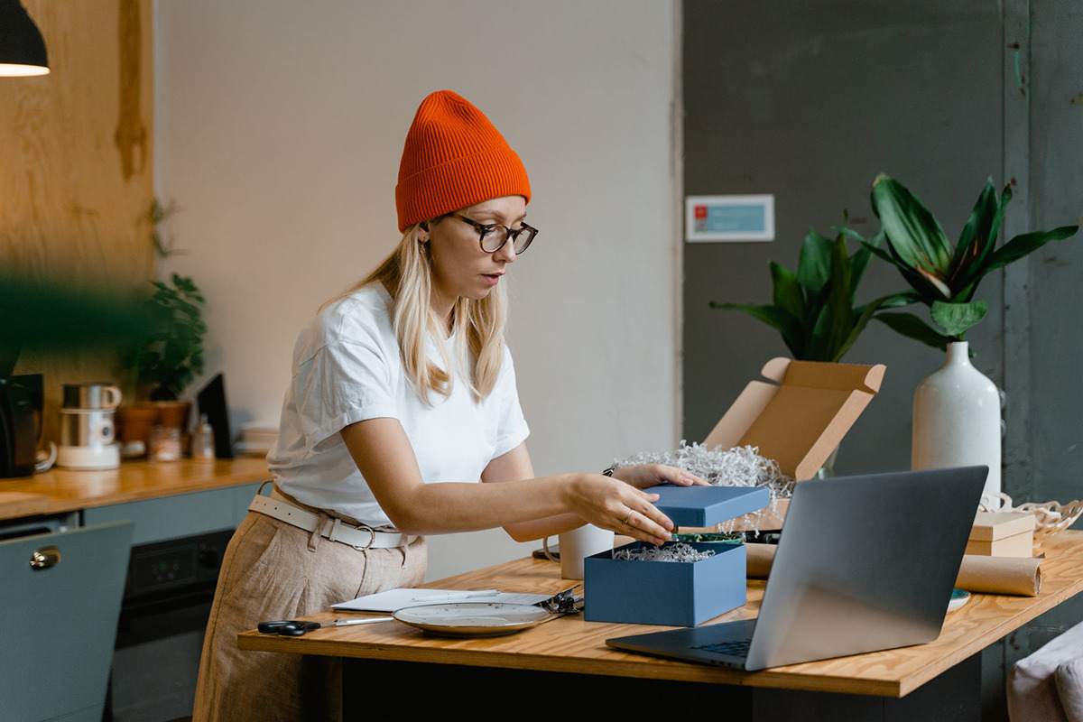 Customer creating unboxing video after prompt from post-purchase experience platform