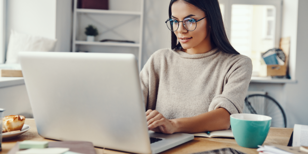 woman with glasses shopping online