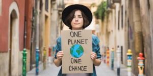 Climate-change-protest-holding-signer-