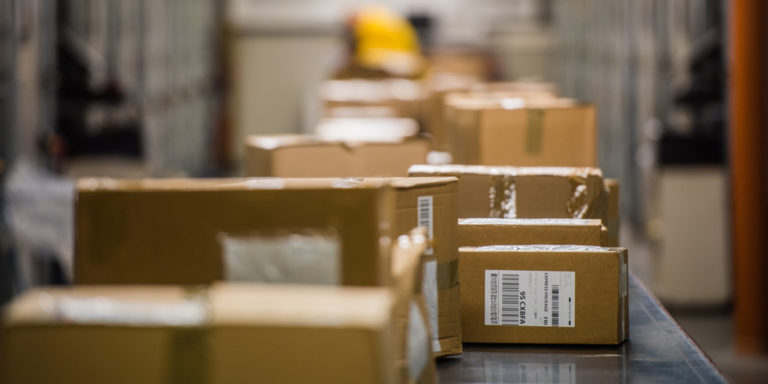 parcels-on-warehouse-conveyor