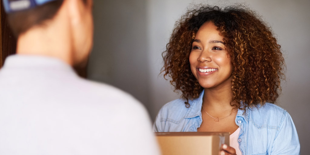 Woman-at-door-receiving- delivery