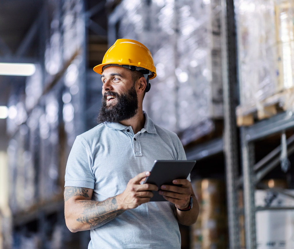 Warehouse worker using multi-carrier shipping software
