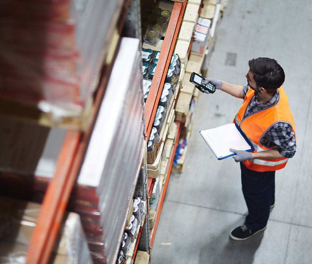 Warehouse worker using multi-carrier shipping software